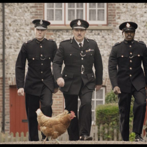 Hugh Skinner as Constable Papperwick, Paul Chahidi as Chief Constable Spedding, in 'Wicked Little Letters' Image: Parisa Taghizadeh. Courtesy of Sony Pictures Classic