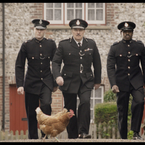 Hugh Skinner as Constable Papperwick, Paul Chahidi as Chief Constable Spedding, in 'Wicked Little Letters' Image: Parisa Taghizadeh. Courtesy of Sony Pictures Classic