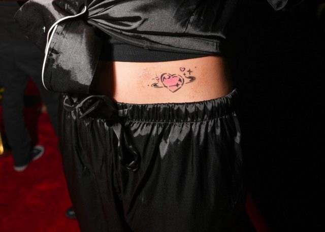 WEST HOLLYWOOD, CALIFORNIA - OCTOBER 08: Tattoo art is seen as 'Love Island USA' star Kordell Beckham kicks off cuffing season with the creators of iconic 'Got Milk?' to debut "Real Matches are Back" campaign at Mel's Drive In on October 08, 2024 in West Hollywood, California. (Photo by Presley Ann/Getty Images for California Milk Processor Board - Creators of Iconic 'GOT MILK?')