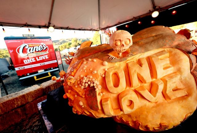 CALABASAS, CALIFORNIA - OCTOBER 30: The world's largest pumpkin is displayed at Raising Cane's unveiling of the world's biggest pumpkin with Todd Graves at Nights of Jack on October 30, 2024 in Calabasas, California.  (Photo by Matt Winkelmeyer/Getty Images for Raising Cane's)