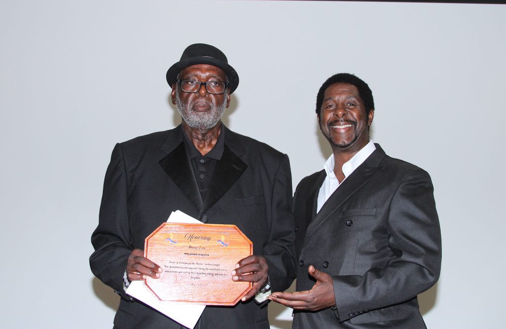 Honoree Dennis Love and Presenter Rodney Allen Rippy Photo/Michele Marrota