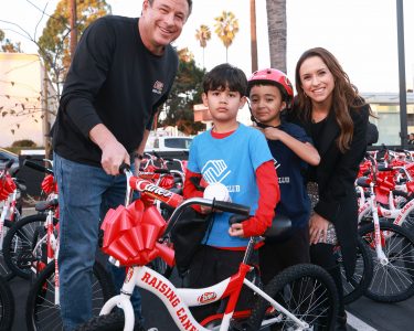 Lacey Chabert Teams Up With Raising Cane’s Founder Todd Graves To Donate 120 Bikes To Boys & Girls Club Of Hollywood